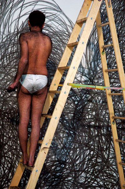 Nikhil_Chopra_on_ladder.jpg